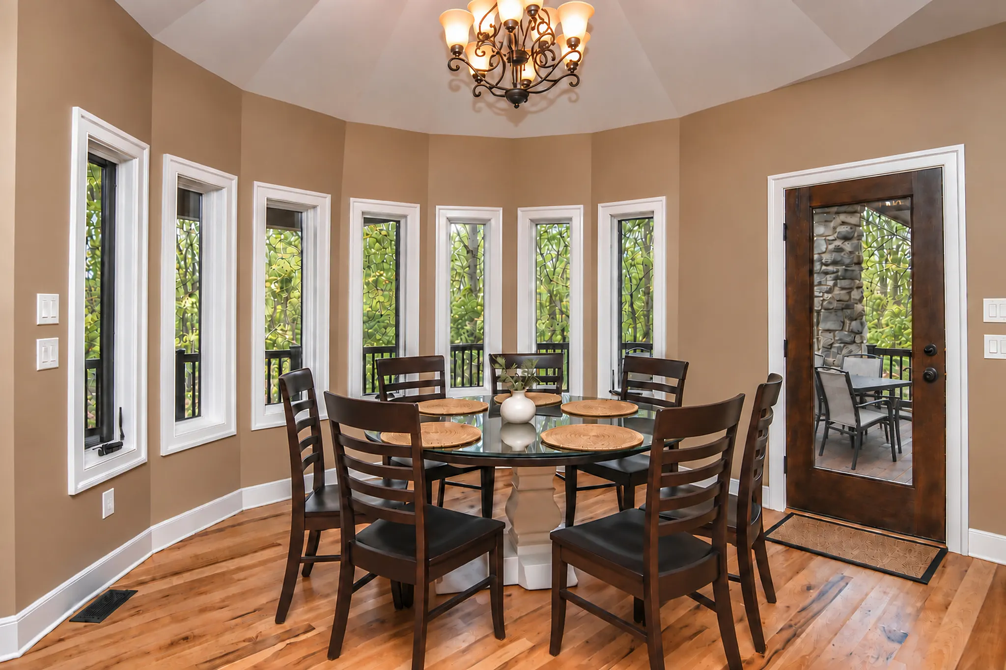 Turret breakfast nook ringed with windows