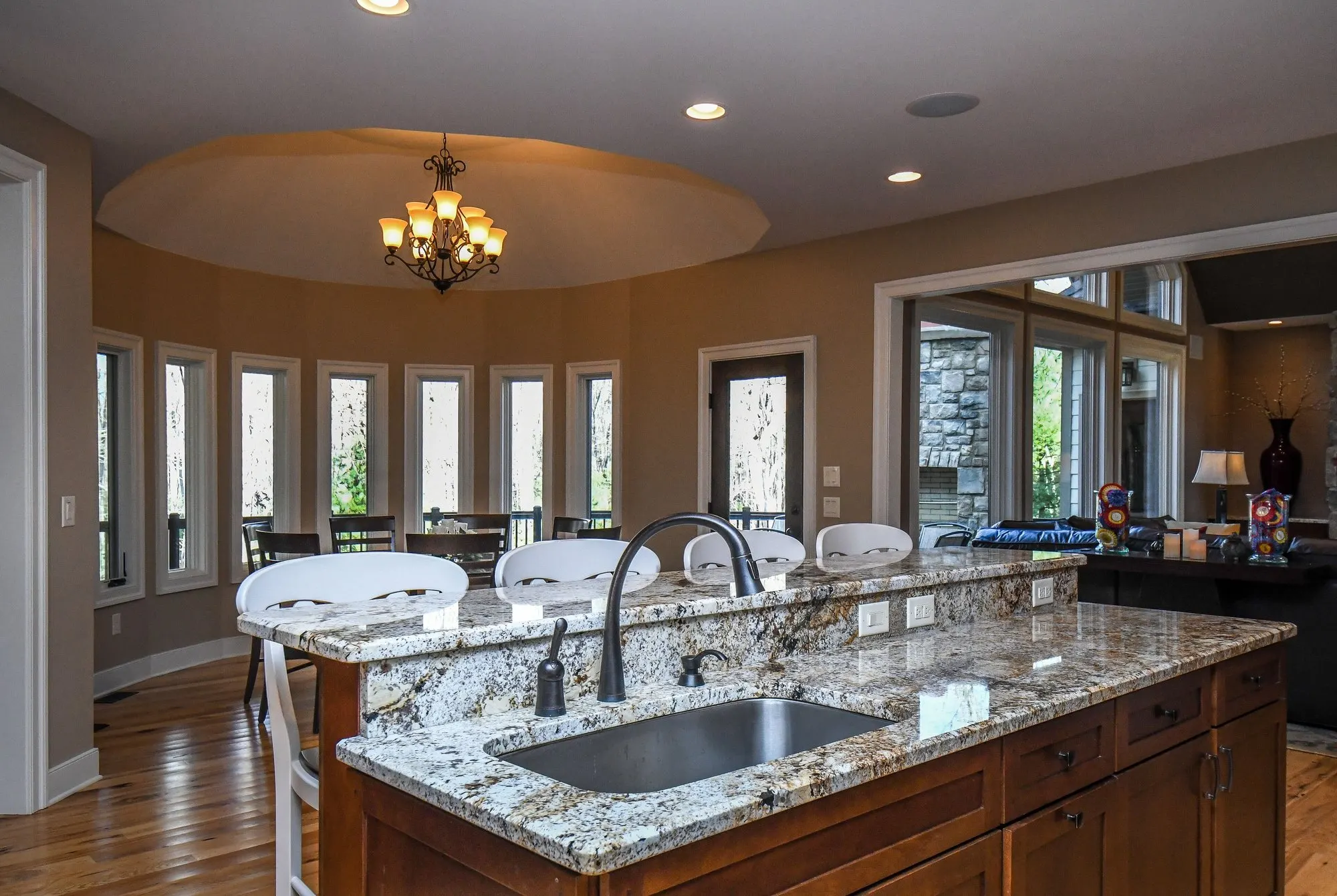 Kitchen island with the turret breakfast nook behind it