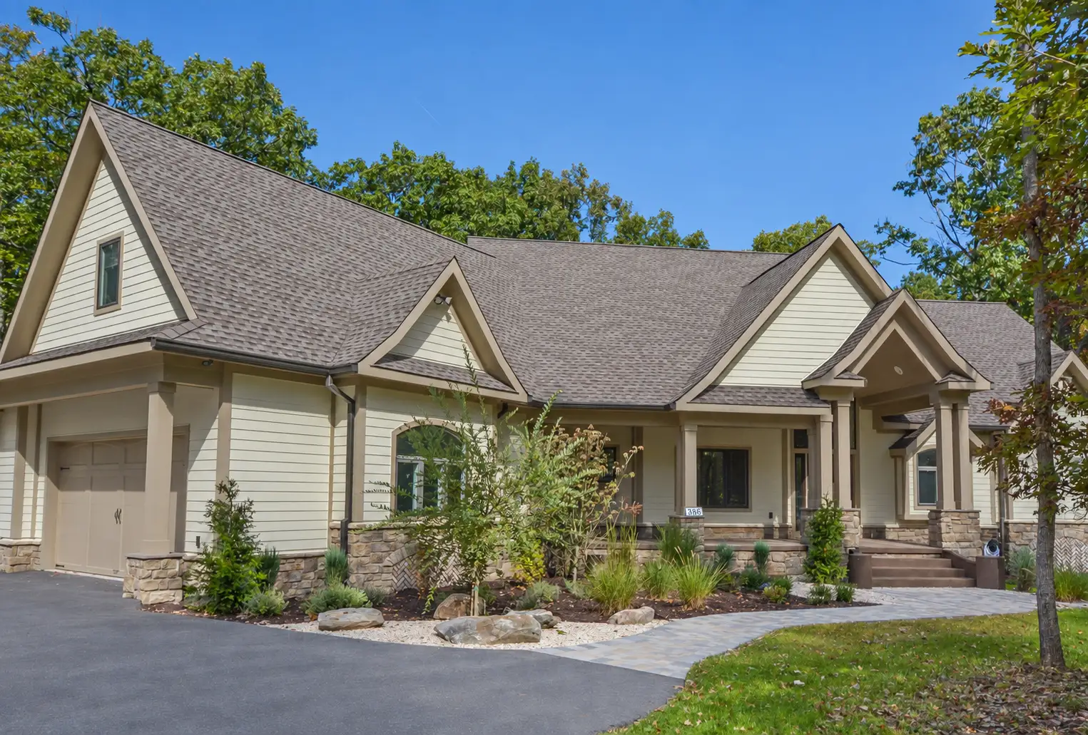 Woodland Chalet exterior in its wooded Deep Creek Lake setting