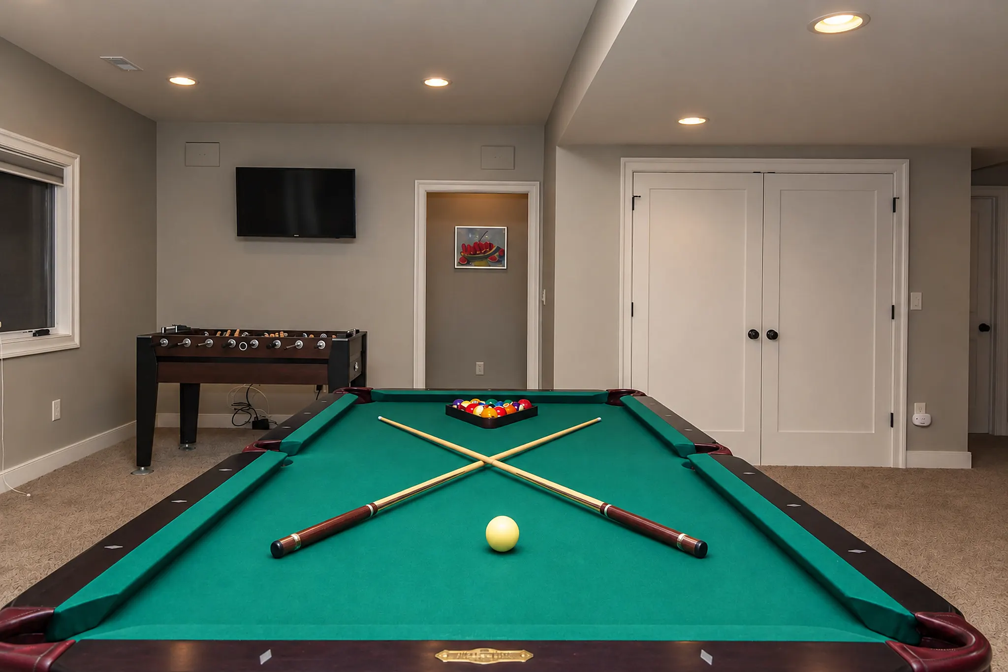 Billiards table in the game room
