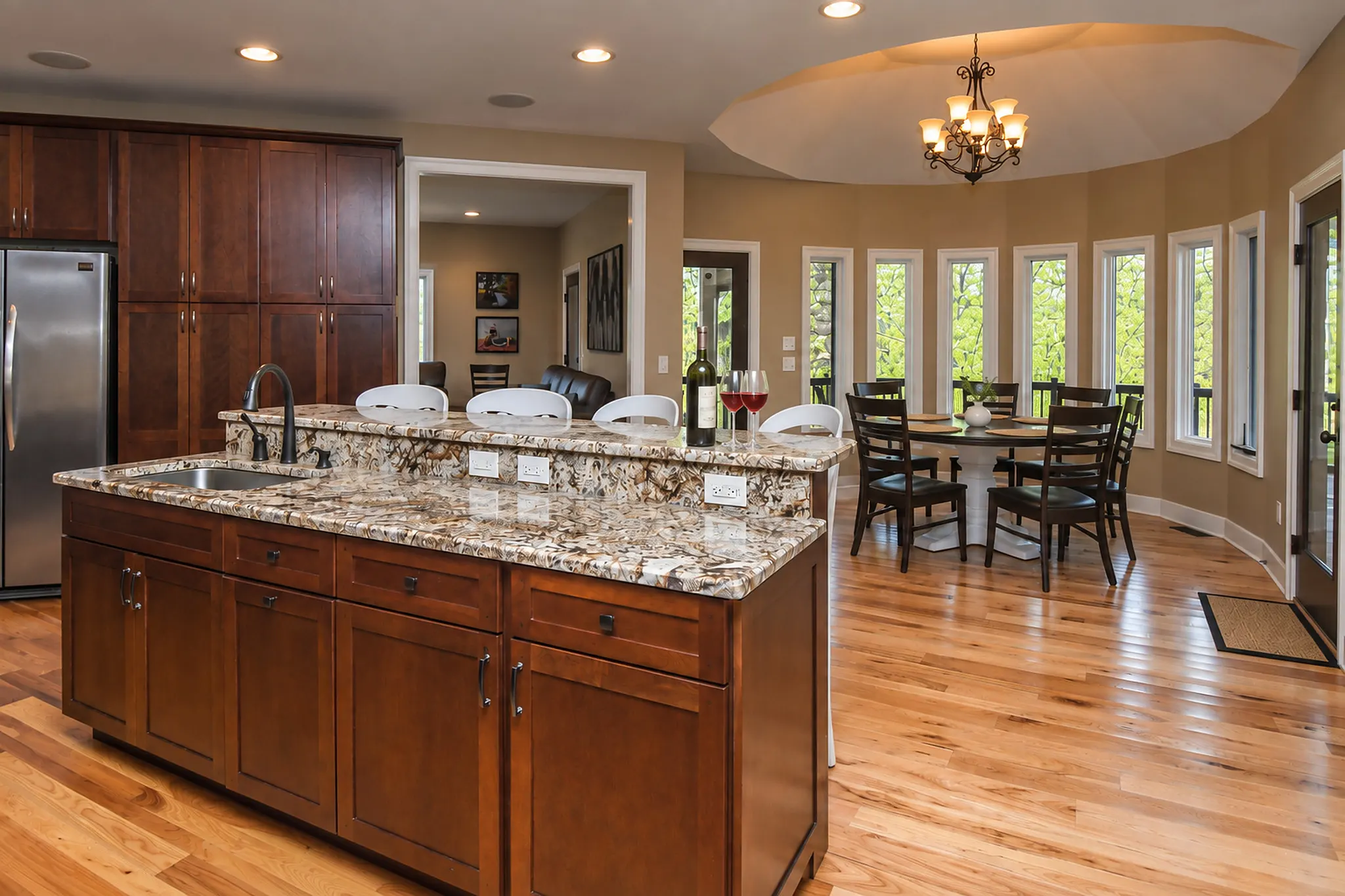 Main kitchen island bar looking into the turret breakfast nook