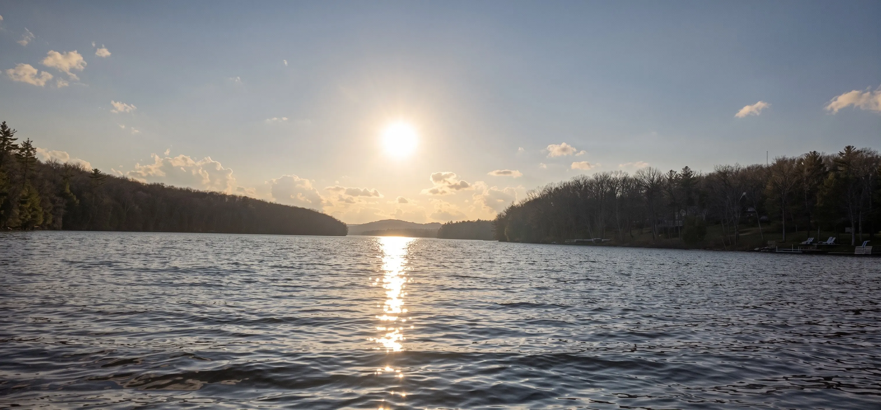Evening sun over Deep Creek Lake near the community dock