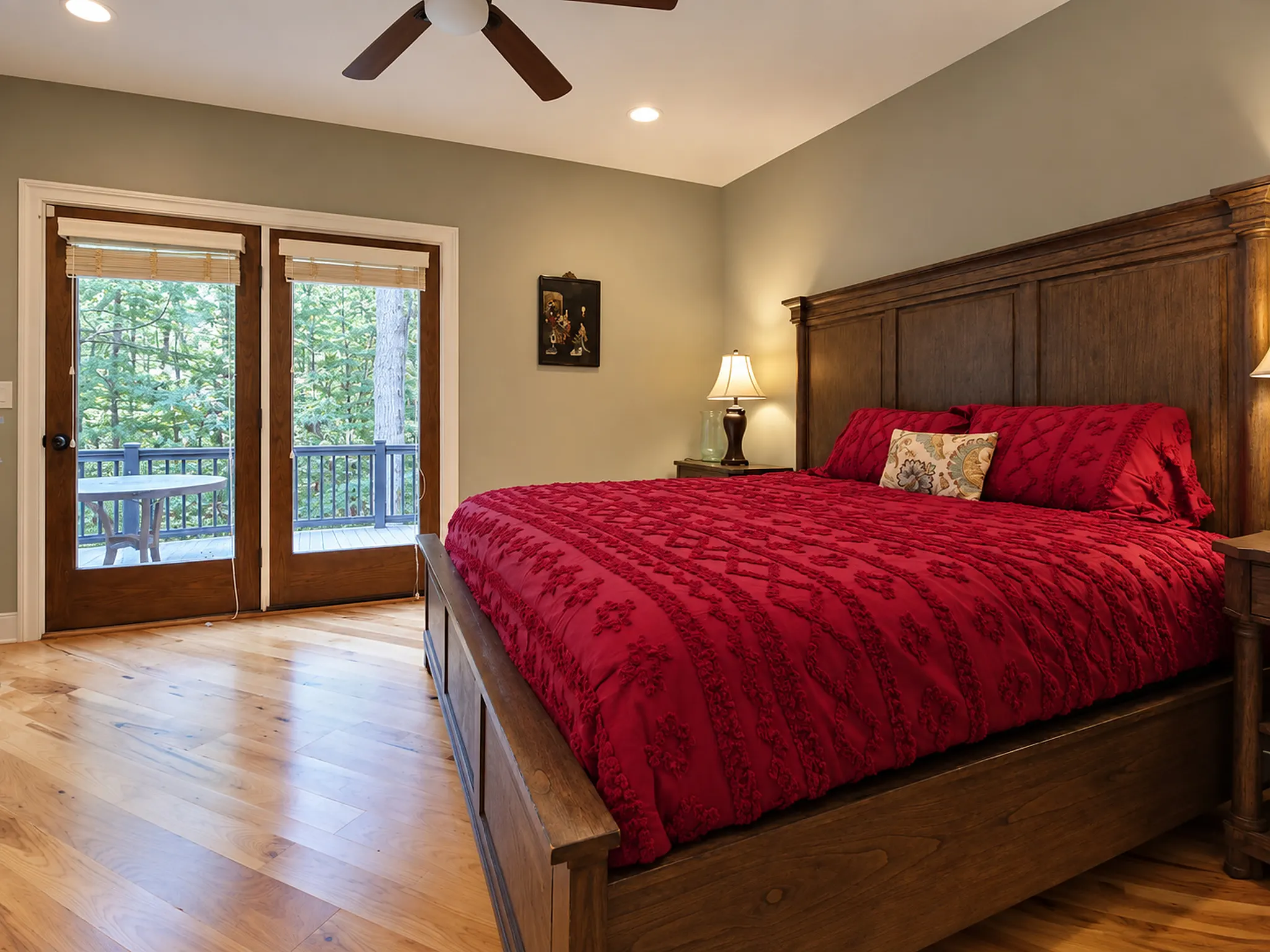 King bedroom with French doors opening to the deck