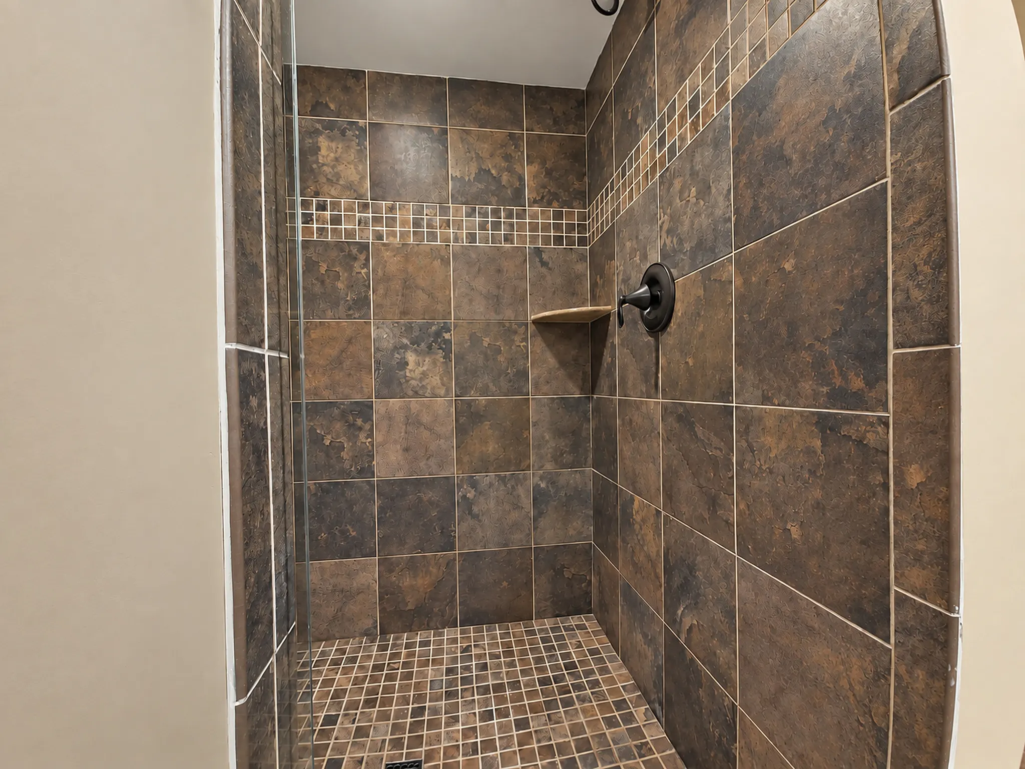 Second suite en-suite with a walk-in tile shower