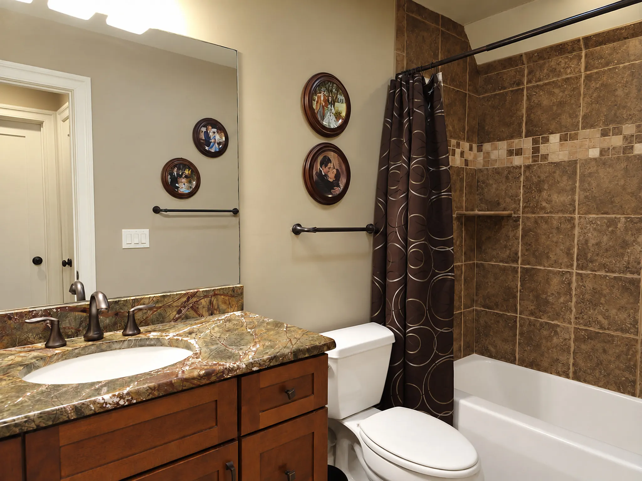 Upstairs full bath with granite vanity and tub shower