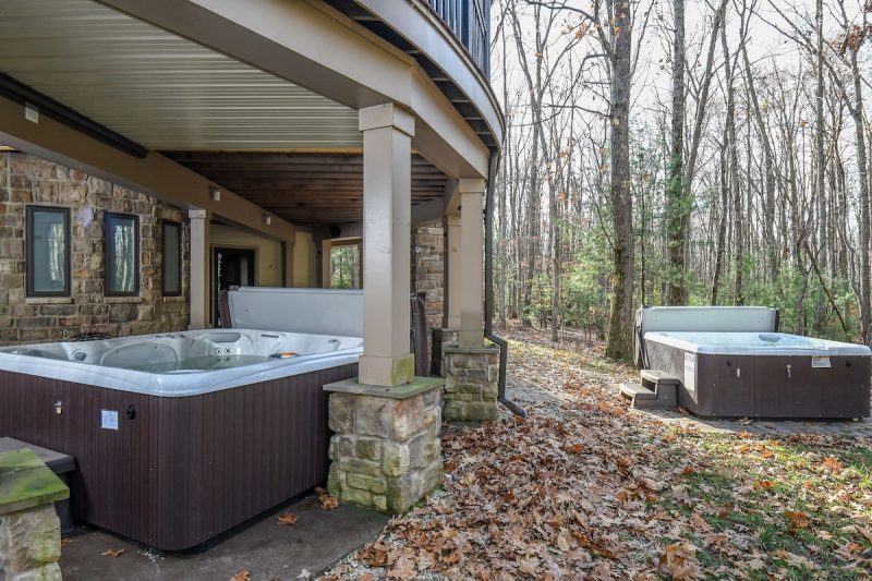 Outdoor spa and hot tub at Woodland Chalet