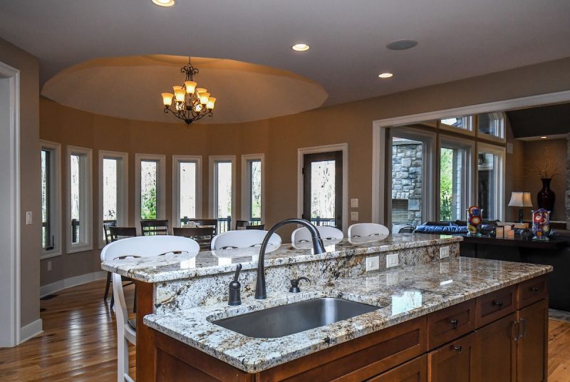 Fully equipped kitchen with modern appliances at Woodland Chalet