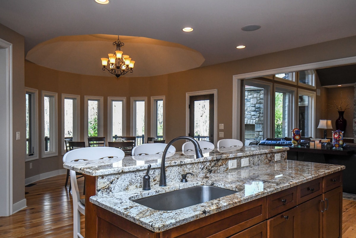 Fully equipped kitchen with modern appliances at Woodland Chalet