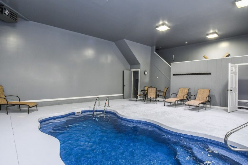 Private heated indoor pool at Woodland Chalet