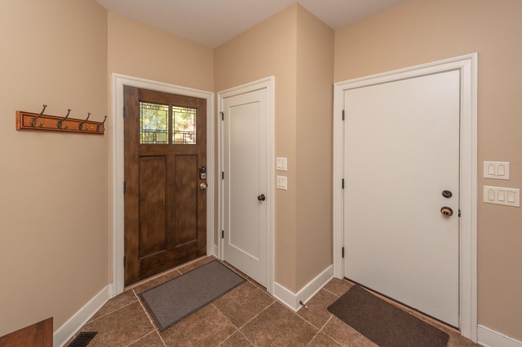 Grand foyer and entryway welcoming guests into Woodland Chalet