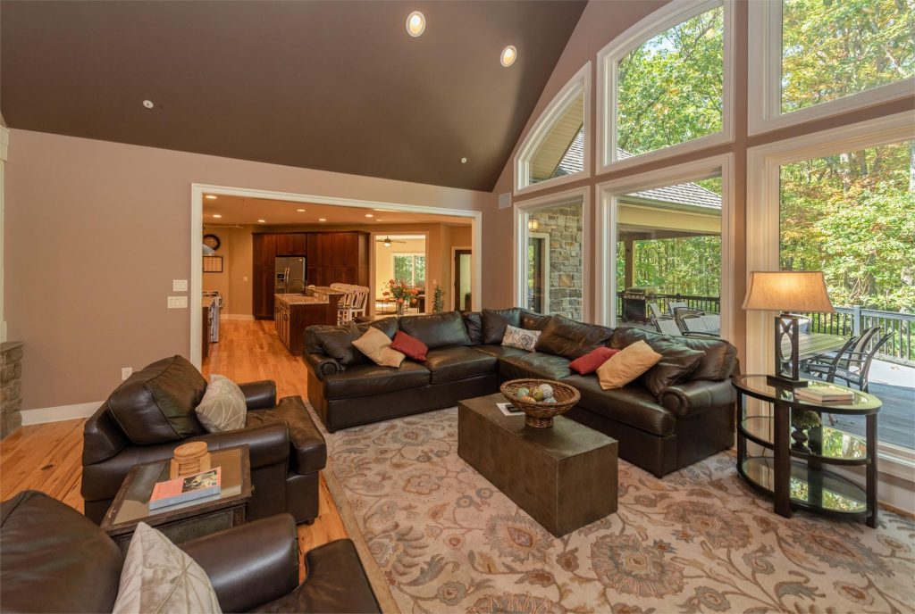 Living room seating area with comfortable furnishings and natural light