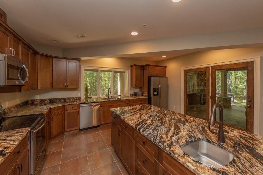 Second full kitchen on the lower level for convenient group meal preparation