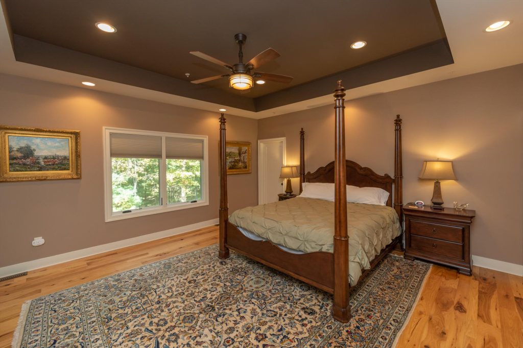 Master suite sitting area with private wet bar and spacious layout