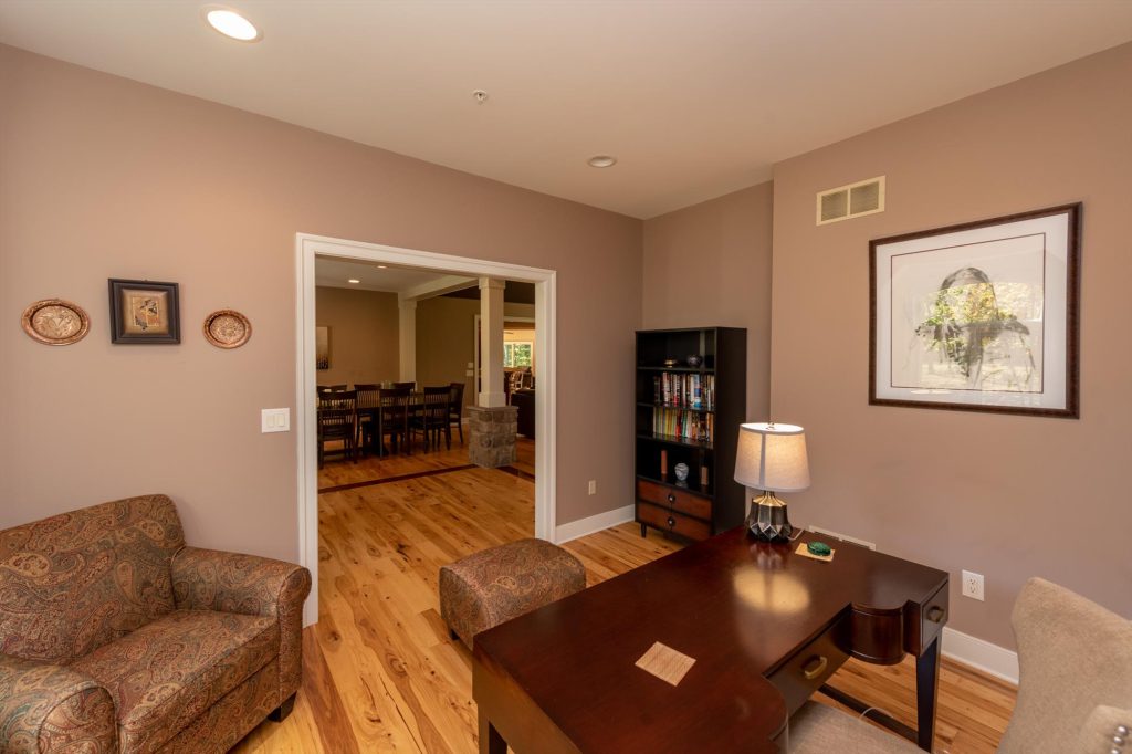 Private home office with desk and workspace for remote work guests